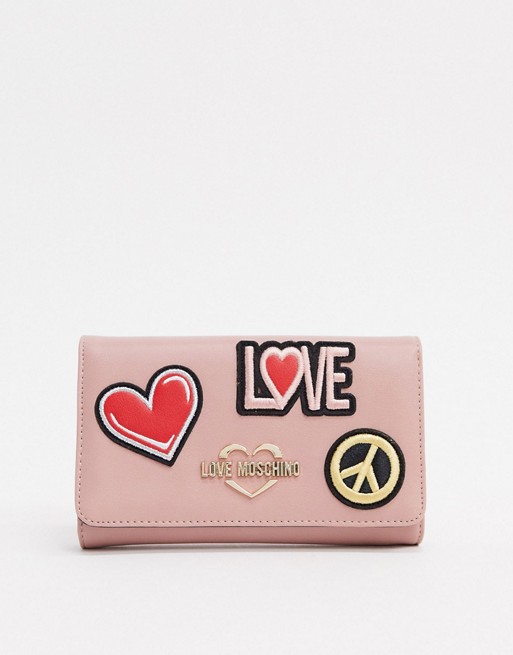 Love Moschino patches purse with chain strap in pink