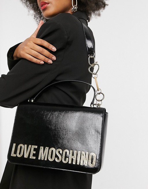 Love Moschino peace love and stars shoulder bag in black | ASOS