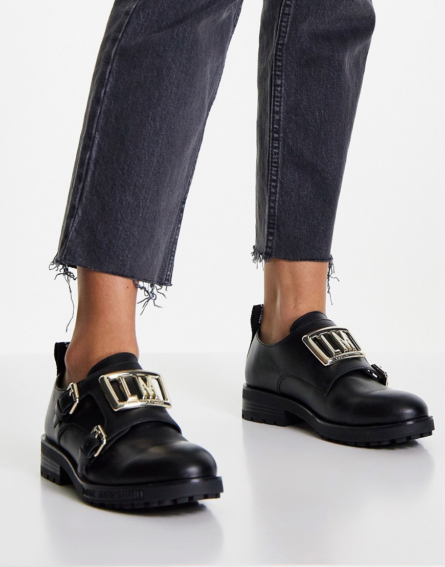 Love Moschino - Platte schoenen met dikke zool en bandje met gesp in zwart