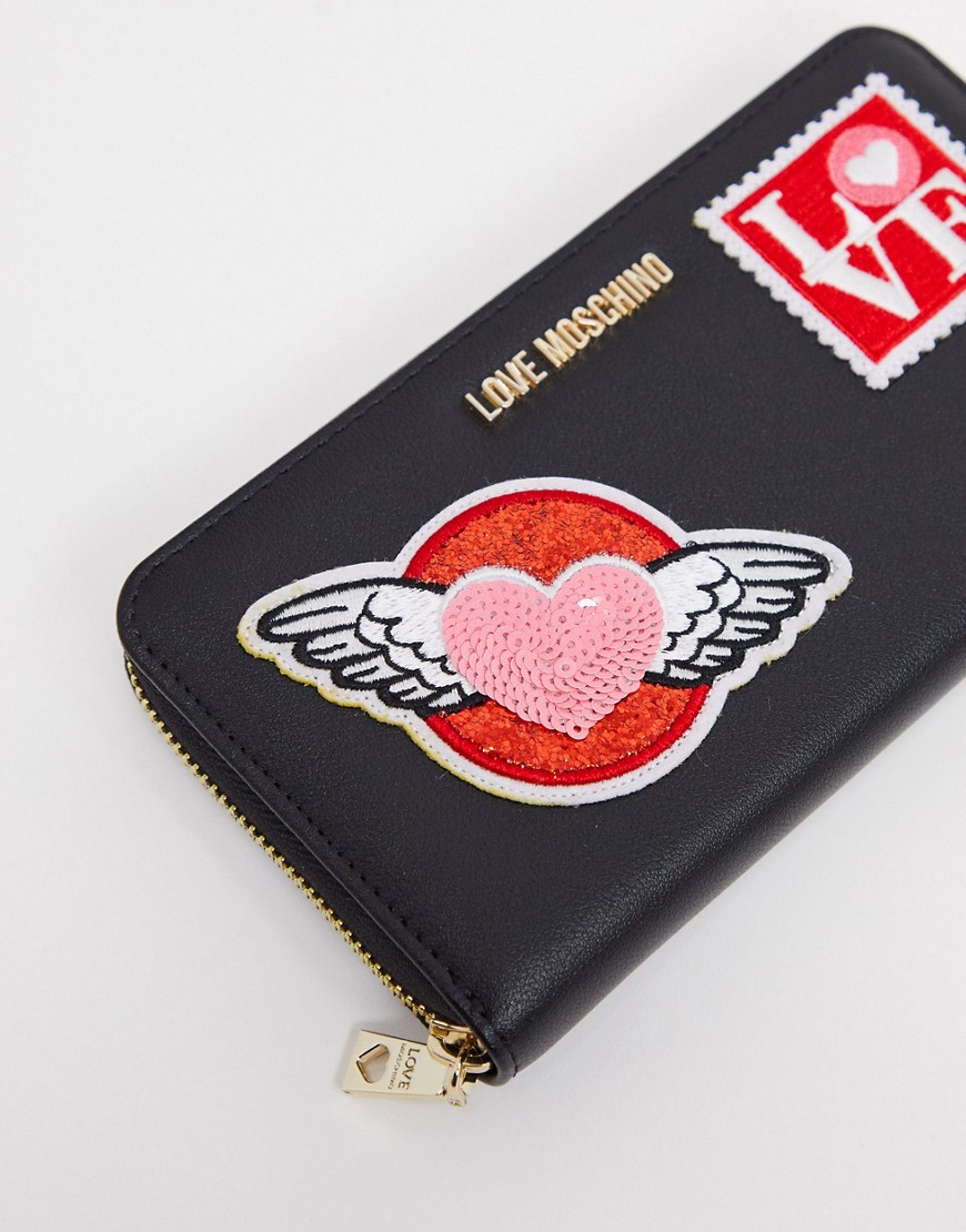 Love Moschino purse with patches in black