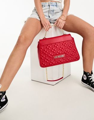 Love Moschino quilted flap over cross body bag in red