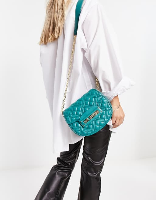 Love Moschino quilted saddle cross body bag in green ASOS