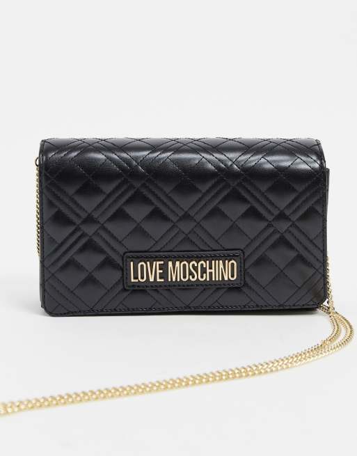 love moschino embellished trainer in black