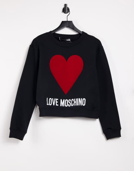 Black sweatshirt with red heart sale