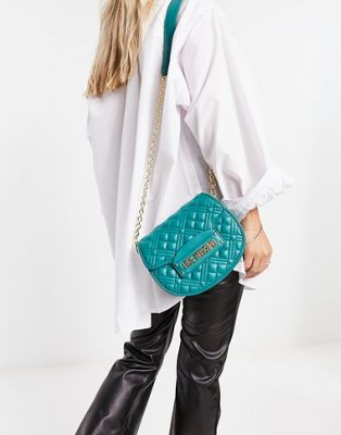 Love Moschino quilted saddle cross body bag in green - ASOS Price Checker