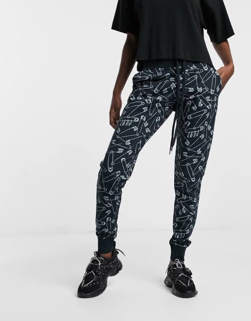 Love Moschino safety pin print joggers in black