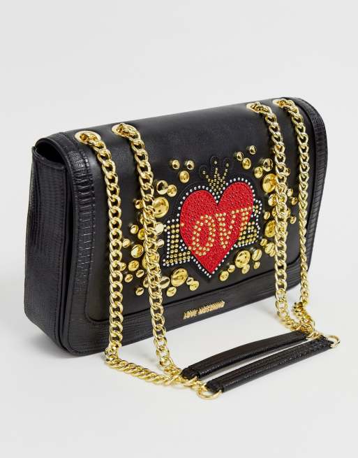 love moschino embellished trainer in black