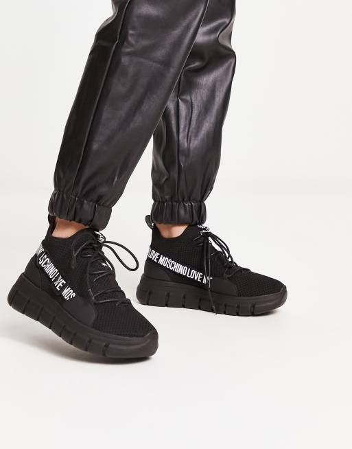 Love Moschino side logo knit sneakers in black