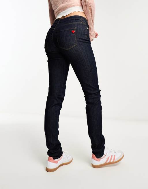Love Moschino - Skinny jeans met hartvormige stud in donkere wassing 
