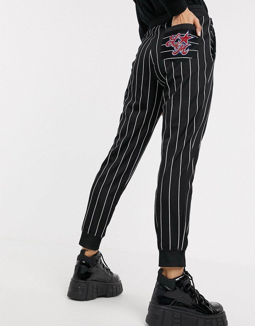Love Moschino star embroidered logo stripe joggers-black