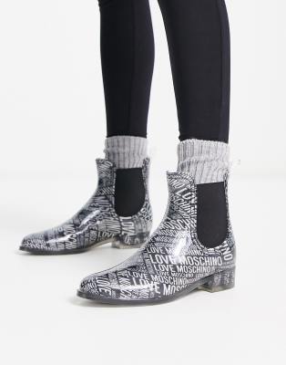 Love Moschino - Stiefel mit durchgehendem Logomuster in Silber