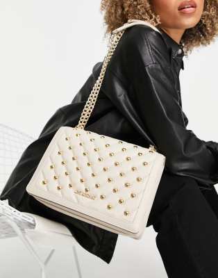 cream moschino bag
