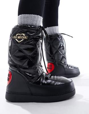 Love Moschino - Wattierte, hohe Boots in Schwarz