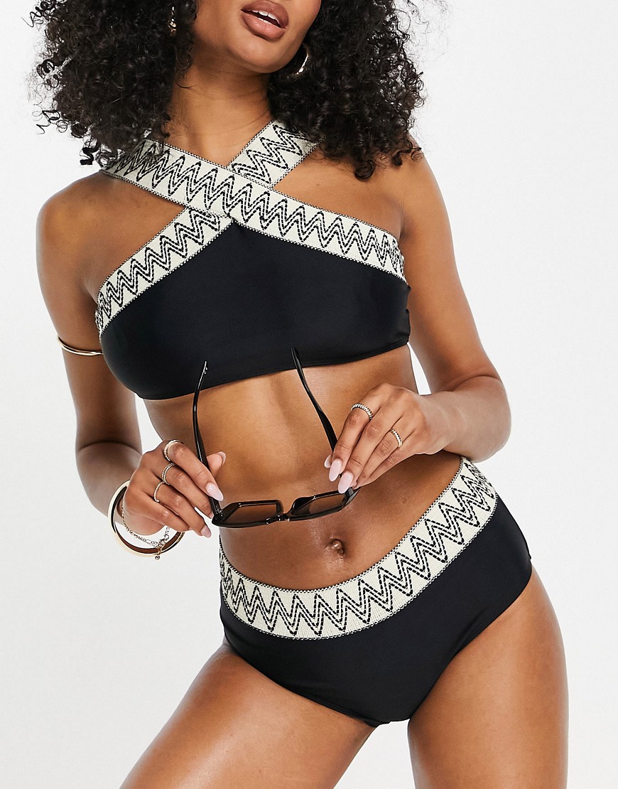 cross detail bikini top with contrast zig zag banding in black and white
