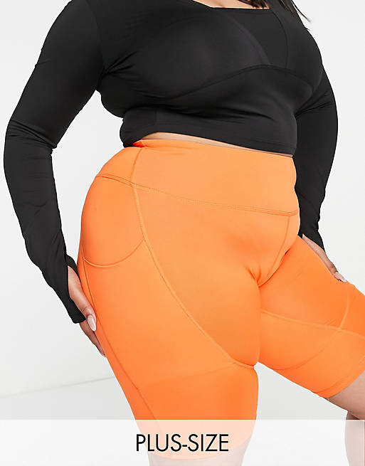 Love & Other Things Plus gym legging shorts in orange