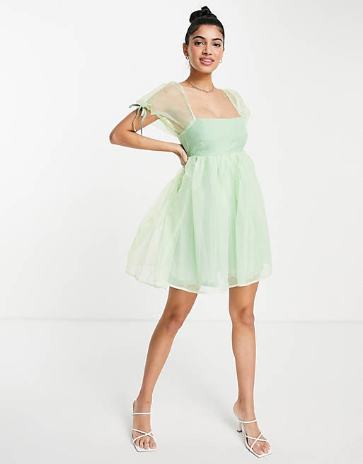 Love Triangle baby doll mini dress with square neck line and puff sleeves in light green