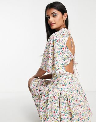 Love Triangle flutter sleeve playsuit in spring floral