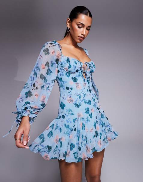 Love Triangle - Mini-melkmeisjesjurk met strikdetail en bloemenprint in blauw - view 1