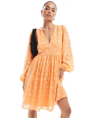 Lovedrobe Long sleeve floral burn out mini dress in orange