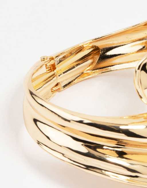 Lovisa Lovisa gold ribbed wave wrap wrist cuff in gold | ASOS