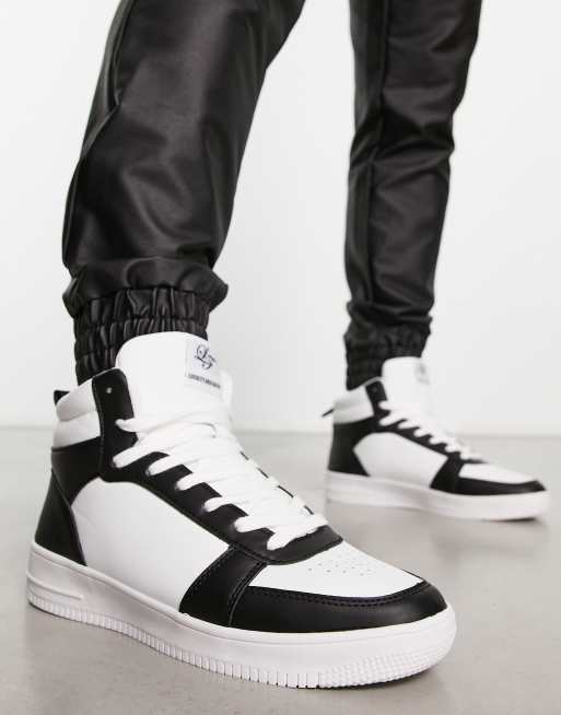 Black and white shop high top trainers