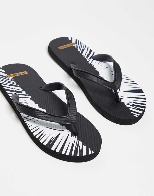 Loyalty and Faith logo pool flip flops in black