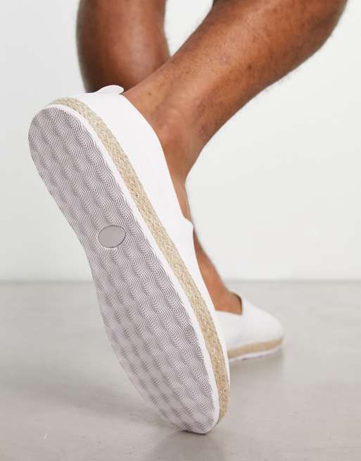 White slip store on espadrilles