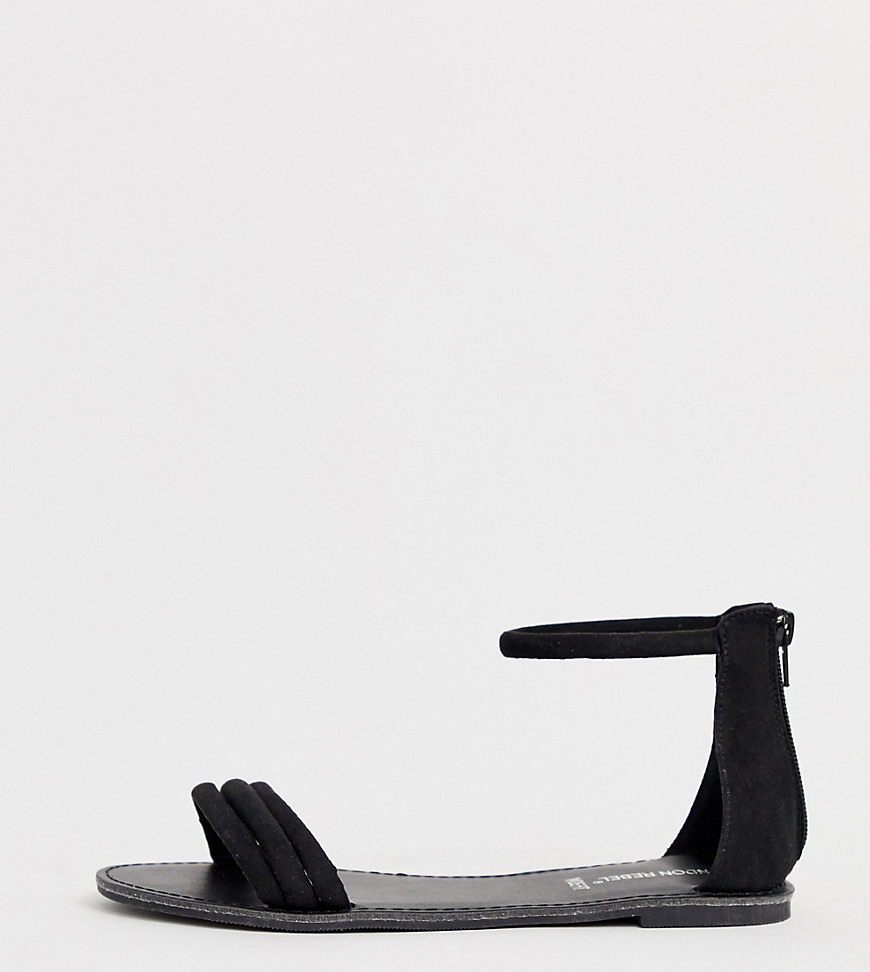 Læstsiddende, flade sandaler fra London Rebel-Sort