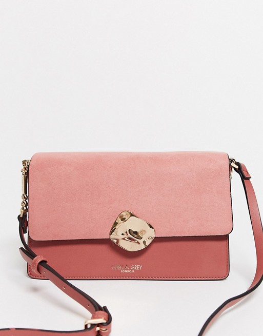 Luella Grey cross body bag in rose with contrast suede front flap and molten gold buckle