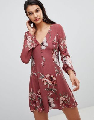 Lunik – Blommig klänning med vida ärmar-Röd
