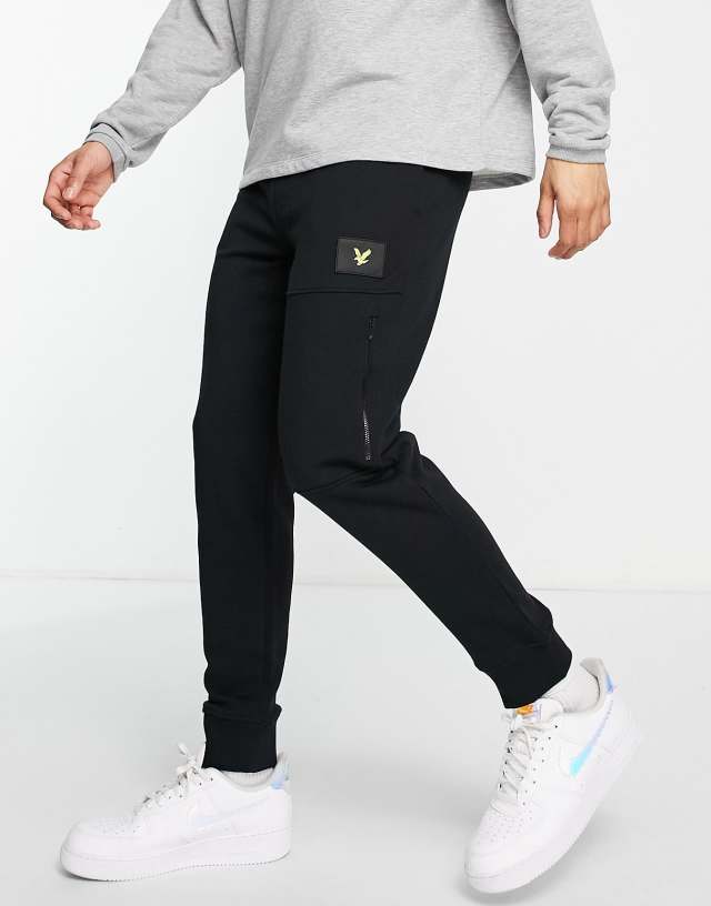 Lyle & Scott badge logo track pants in black