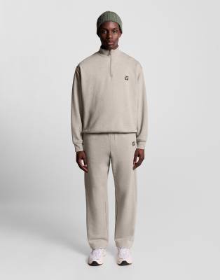 Lyle & Scott loungewear 1/4 zip sweatshirt in oatmeal marl-White