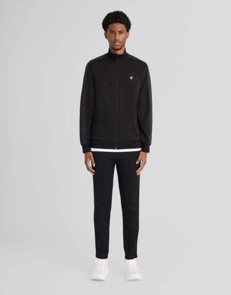 Lyle & Scott Mid bottoms padel taped joggers in z865 jet black - view 1