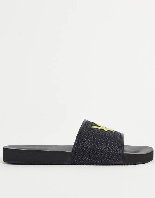 Lyle & Scott sliders in black | ASOS