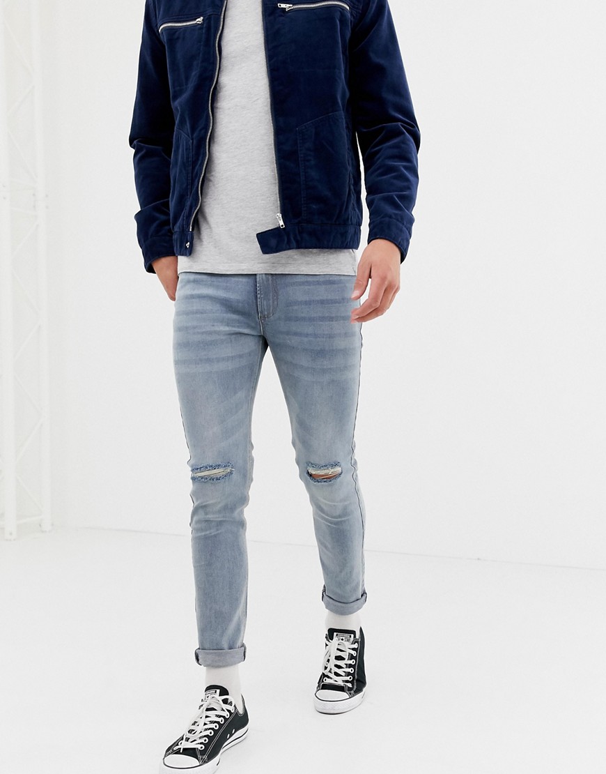 Lyseblå denim jeans i skinny pasform med hullet knæ fra D-Struct-Stenfarvet