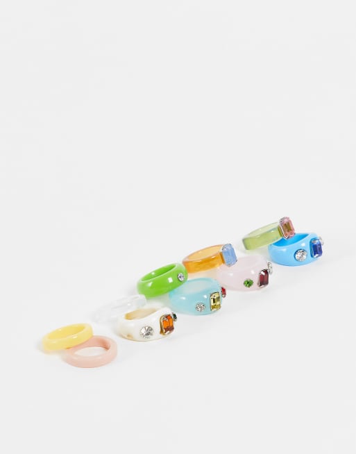 Madein. - Confezione da 10 anelli in plastica e con pietra
