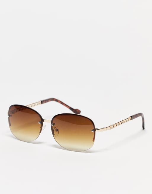 Madein. oval sunglasses with chain arm detail in brown ASOS