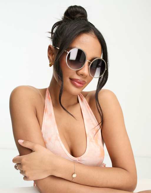 Madein. – Runde Sonnenbrille in Schwarz mit Bogenkantendetail am Gestell