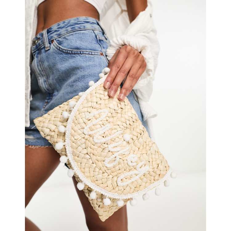 https://images.asos-media.com/products/madein-straw-wifey-pom-pom-clutch-bag/204194577-1-whitepink?$n_750w$&wid=750&hei=750&fit=crop