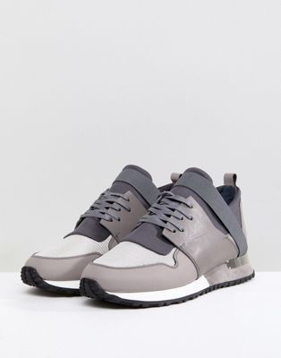 tommy mallet grey trainers