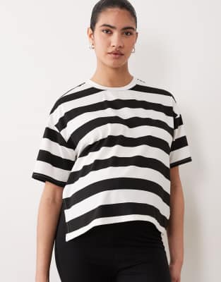 Mamalicious Maternity boxy cropped split side T-shirt in wide black and cream stripes snow white/ black