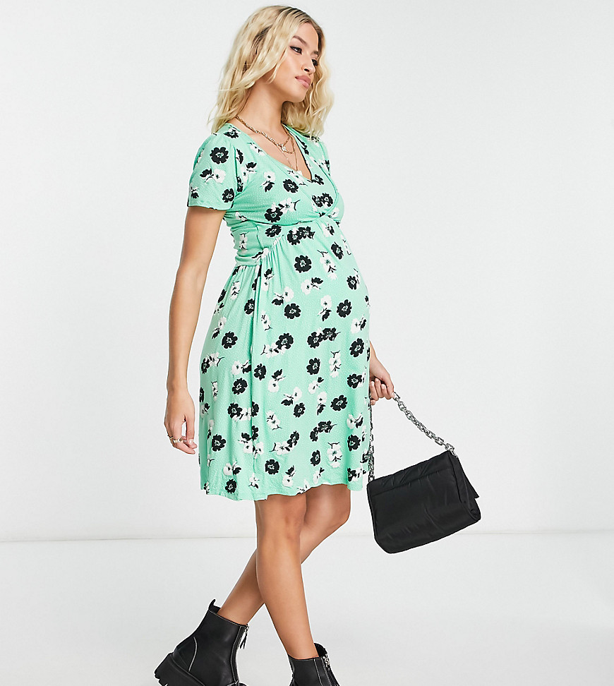 Mama. licious short sleeve v neck mini dress in green abstract floral print