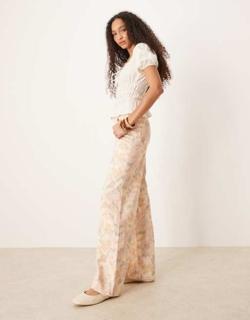 Mango Aba washed floral jeans in pale pink