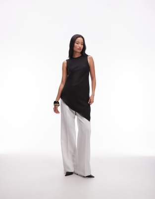 Mango - Ärmelloses Oberteil aus Satin in Schwarz mit asymmetrischem Saum