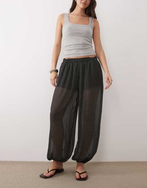 Mango balloon trouser in black polka dot print - view 1