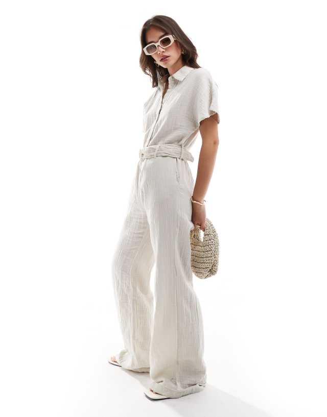 Mango - belted short sleeve jumpsuit in light beige