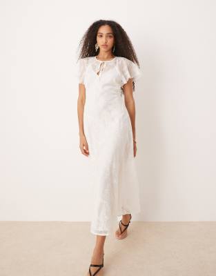 Mango - Besticktes Spitzen-Maxikleid in Weiß mit Cape-Overlay