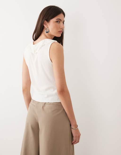 Mango – Biały top bez rękawów z falbanką z przodu, 4 z 4