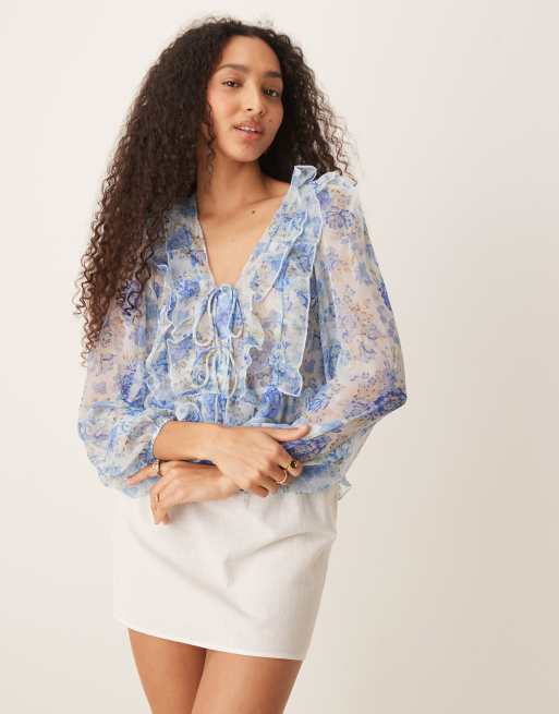 Mango - Blouse met lange mouwen, strikdetail, ruches en bloemenprint in pastelblauw