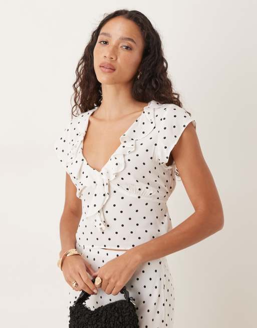 Mango - Blusa corta a pois con volant in coordinato